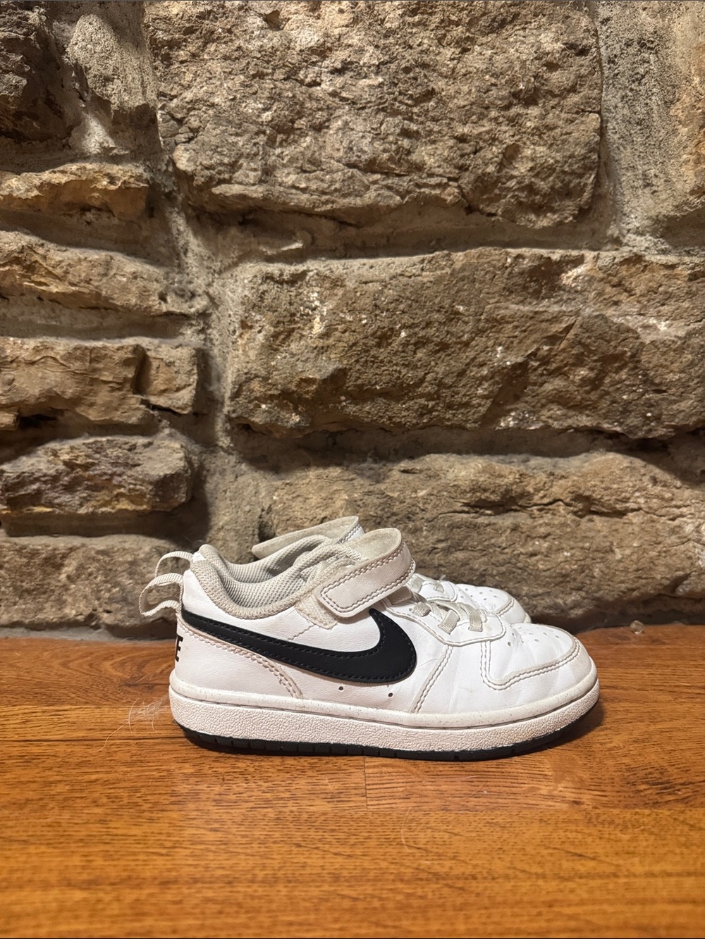 Nike Kids White Sneakers with Black Swoosh